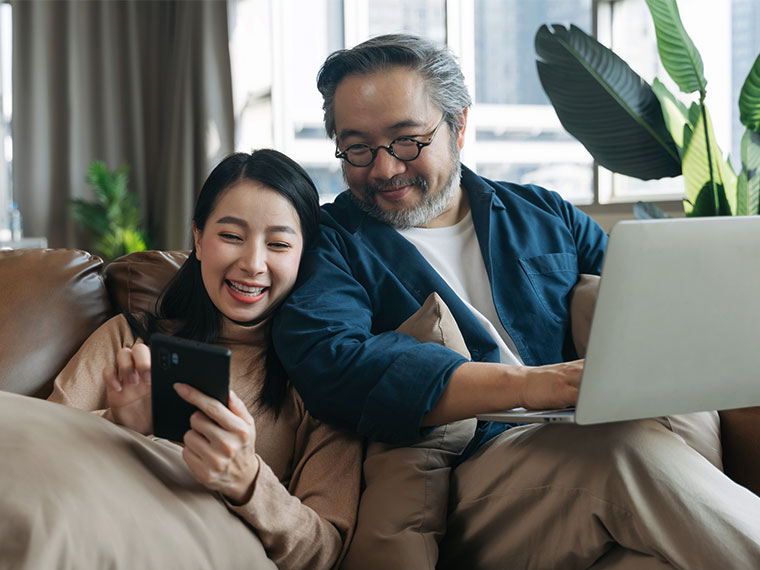 father and daughter smiling