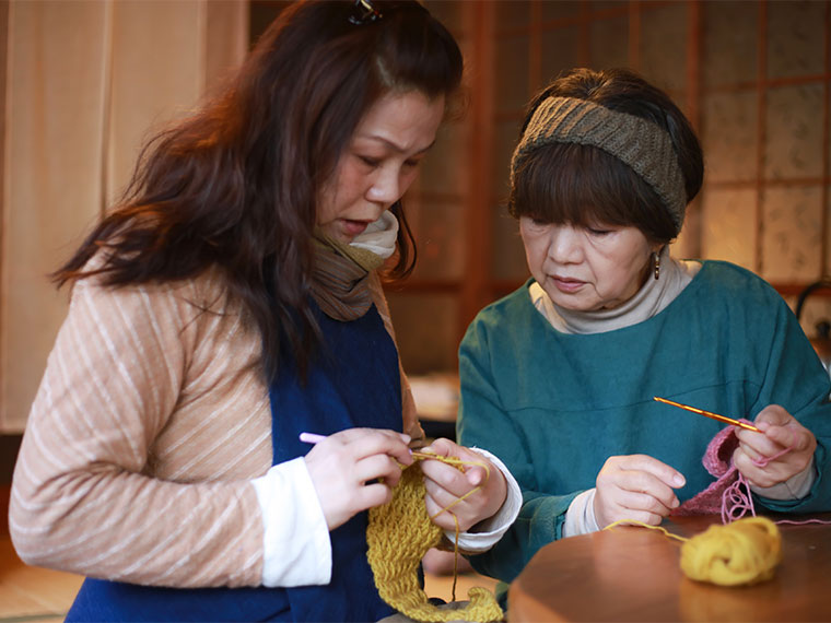 two women knitting
