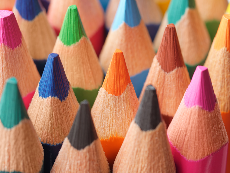 A close-up of brightly coloured pencil crayons 