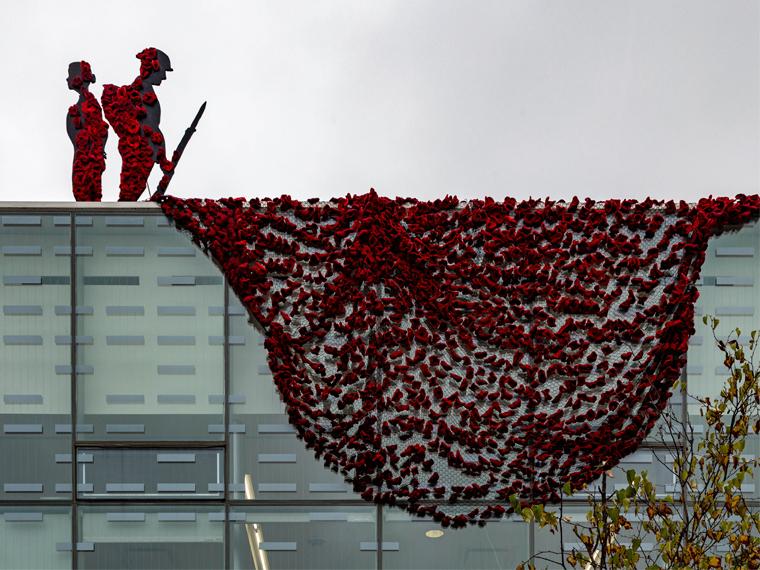 The Cambridge Poppy Project installed on the exterior of Idea Exchange Hespeler. Photo by Brian Duggan.