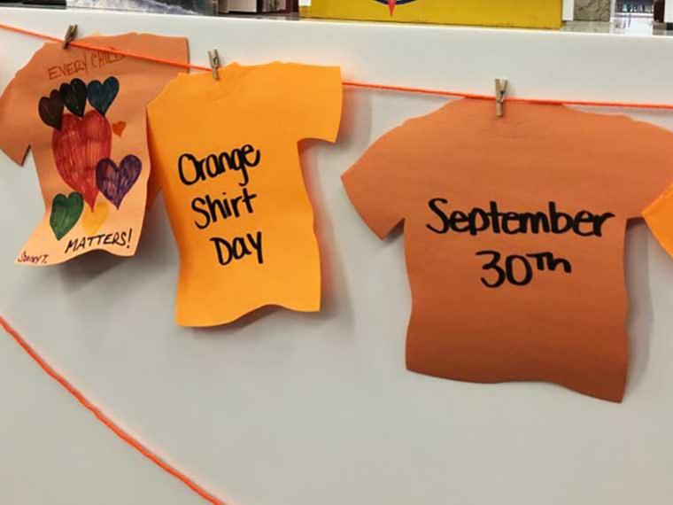 Orange Shirt Day display at Idea Exchange, Queen's Square