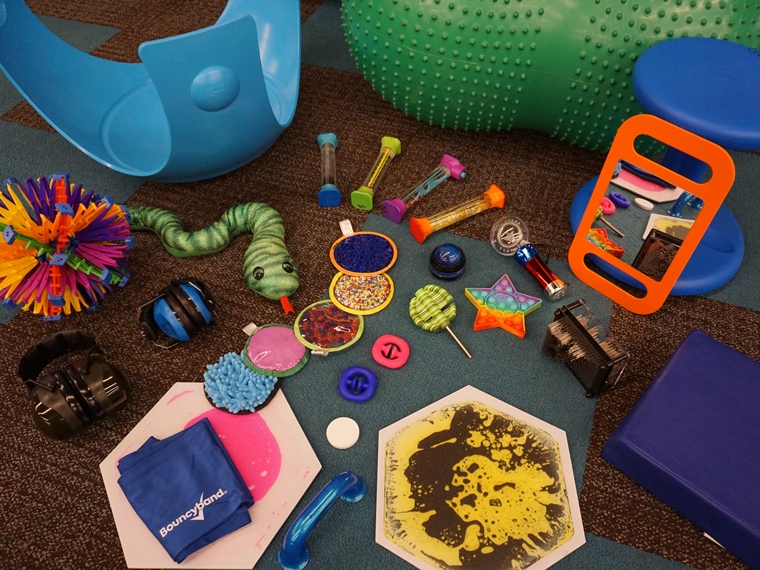 Items from the sensory collection such as colourful toys and stuff animals
