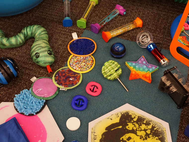 Items from the sensory collection such as colourful toys and stuff animals