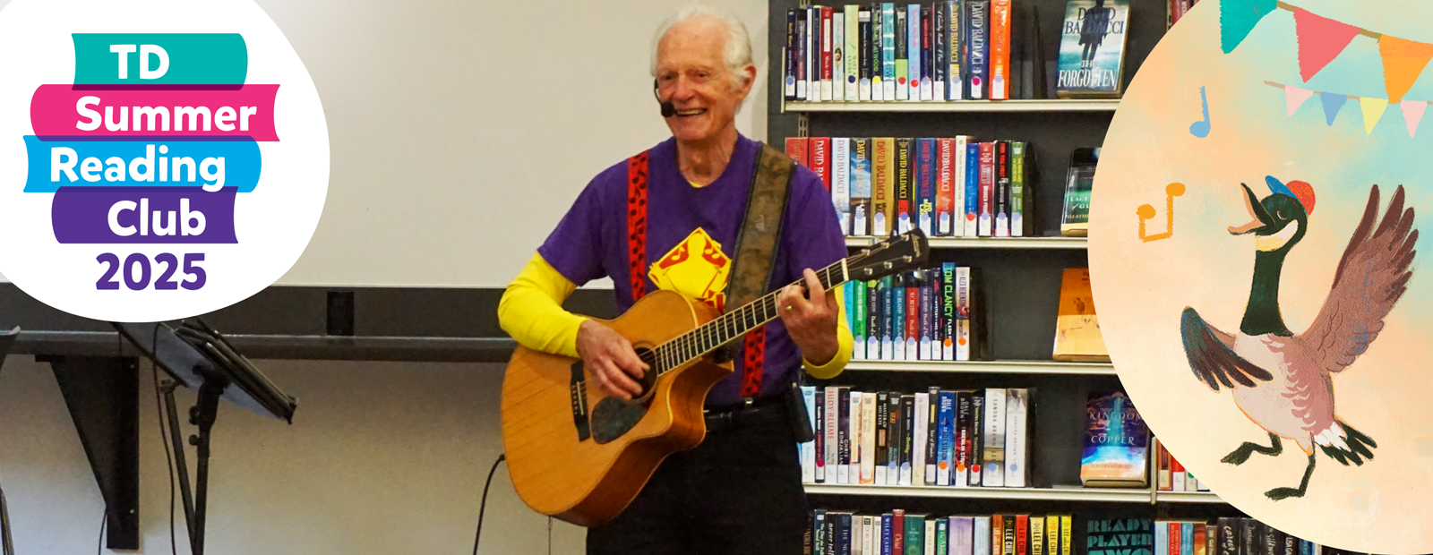 Performer Erick Traplin playing an acoustic guitar and singing.